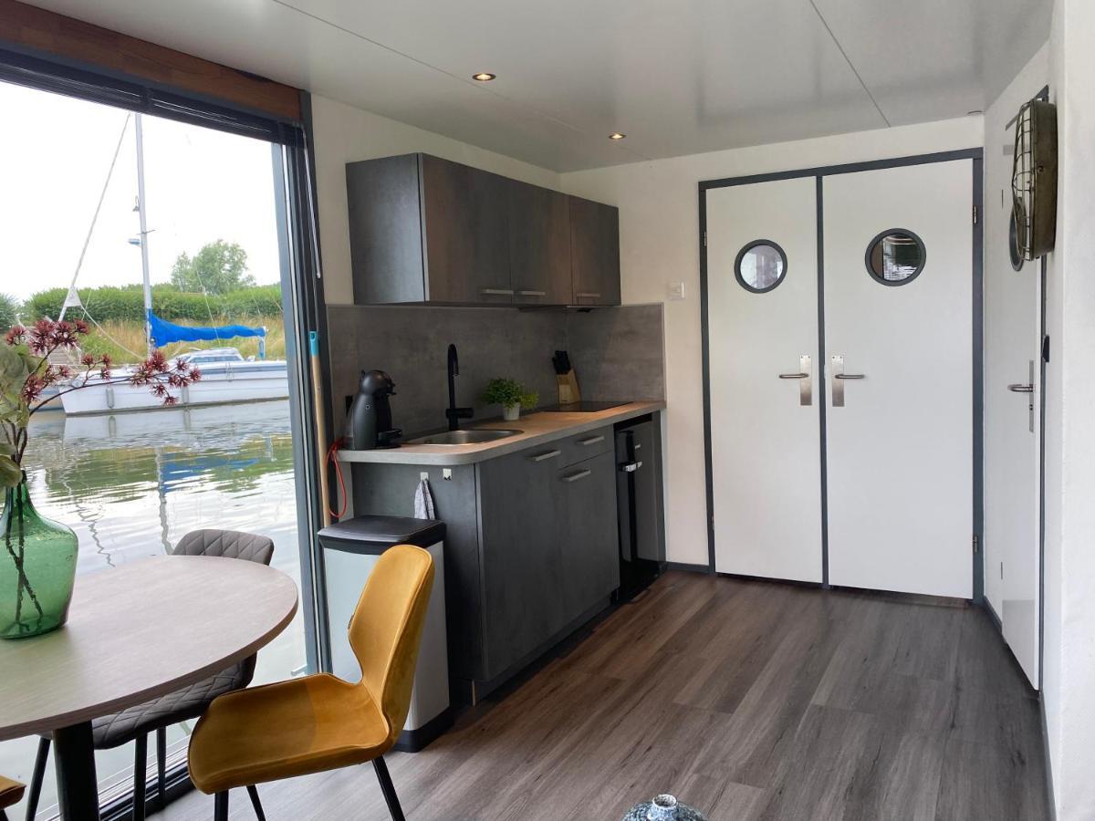 فندق Houseboat De Amstel مونِكِندام المظهر الخارجي الصورة