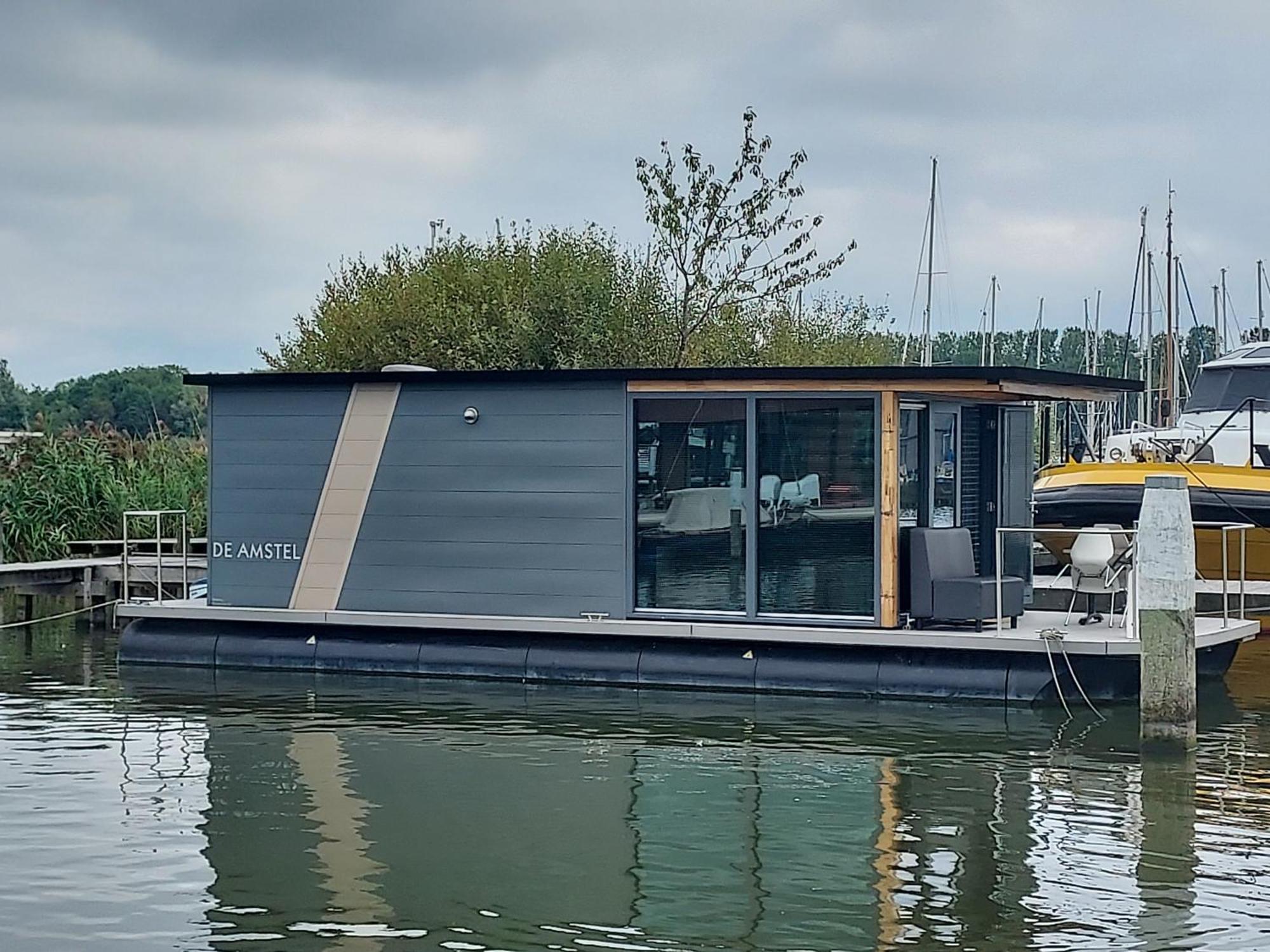فندق Houseboat De Amstel مونِكِندام المظهر الخارجي الصورة